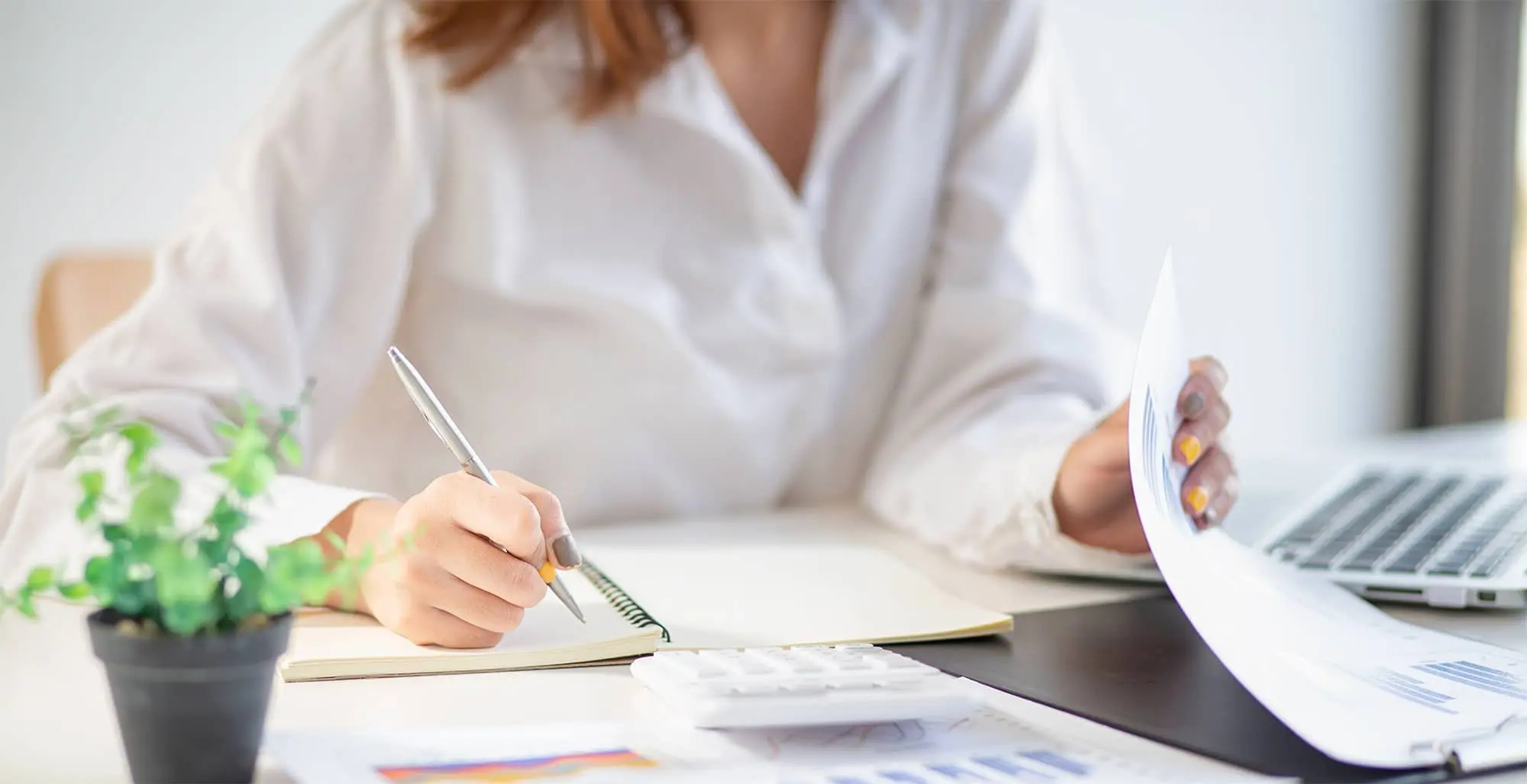 woman calculating expenses