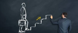 man drawing a stepping career