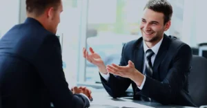 men in suits interviewing each other