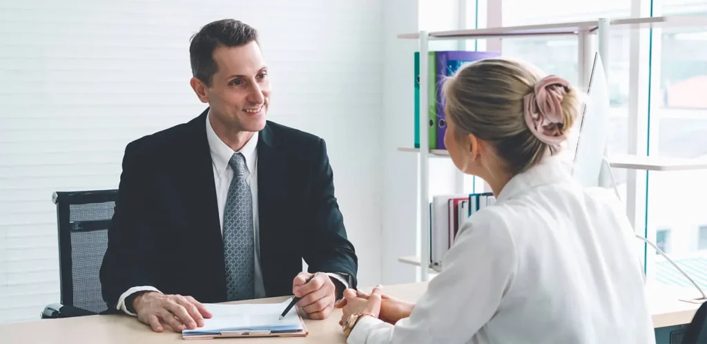 man doing job interview to woman