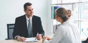 man doing job interview to woman