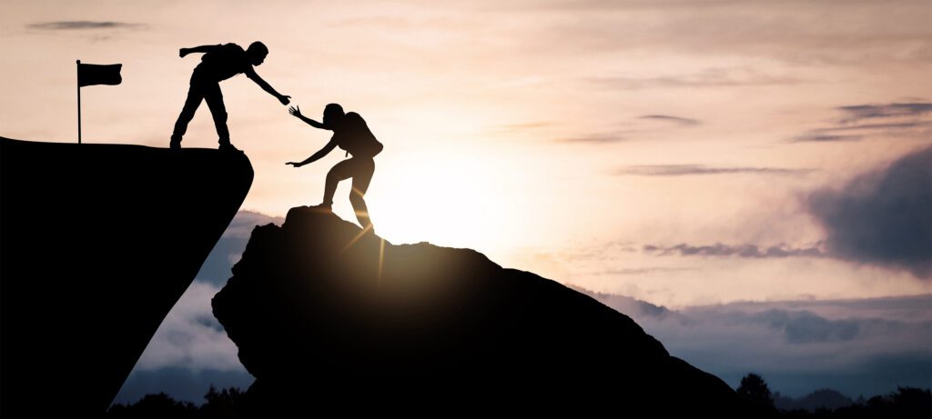 leader helping a member
